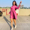 Modern ethnic pink ikat dress with fit-and-flare cut , cotton fabric, side pockets , full sleeves, and collared neck for everyday comfort .