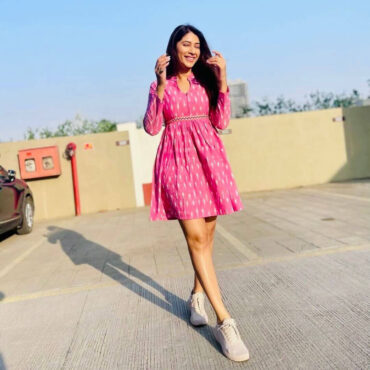 Eco-friendly pink Ikat Handloom dress for women with flare, pockets, artisan weave, and sustainable tailoring by Abravi.