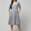 Abravi boho Pochampally Ikat handloom wrap dress with V-neckline, short sleeves, and flared hem.