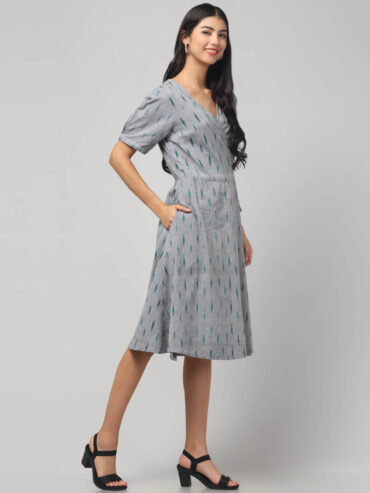 Handloom grey Ikat wrap dress featuring V-neck, tie-up waist, and roomy pockets by Abravi.