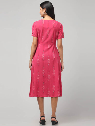 Strawberry Pink handmade Ikat wrap dress with side tie-up and mid length flare.