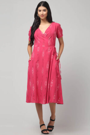 Handloom cotton pink wrap dress featuring Ikat weave and functional pockets.