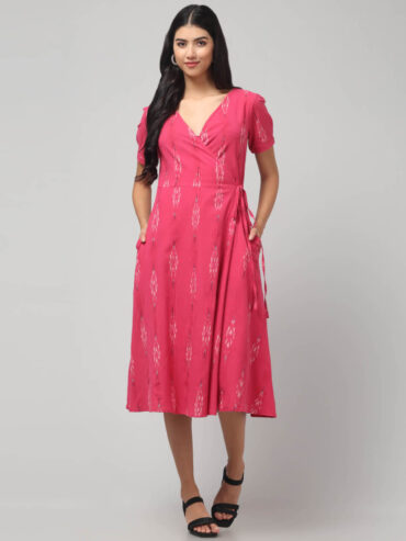 Handloom cotton pink wrap dress featuring Ikat weave and functional pockets.
