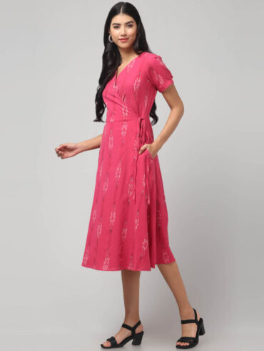 Pink Ikat midi dress with V-neck wrap style and handloom cotton texture.