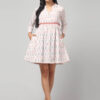 Ikat mini dress with Handcrafted waistband embroidery, long sleeves, and soft cotton fabric texture