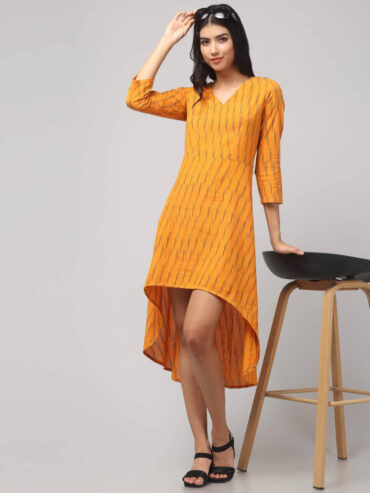 Front view of Yellow Ikat Hi-Low Dress in handloom cotton with V-neck, 3/4 sleeves, airy flare.