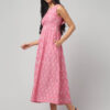 Abravi Pochampally Ikat Handloom everyday chic carnation pink ikat cotton dress with two pockets and bow tie back design.