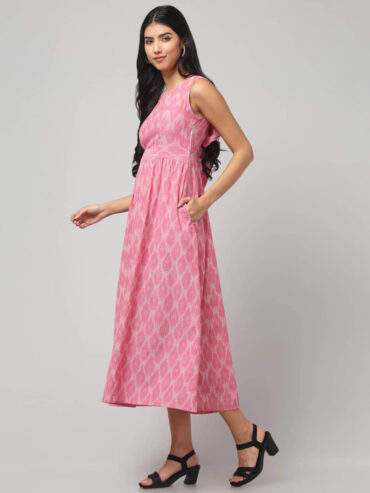 Abravi Pochampally Ikat Handloom everyday chic carnation pink ikat cotton dress with two pockets and bow tie back design.