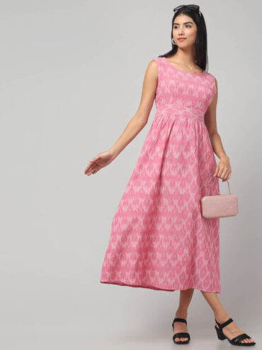 Carnation pink ikat cotton dress with bow tie-back design by Abravi for everyday chic wear.