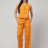 the front view of Indian model showing the Sunny Zest in chorme yellow shade Ikath co-ord set with 2 pockets detailing.
