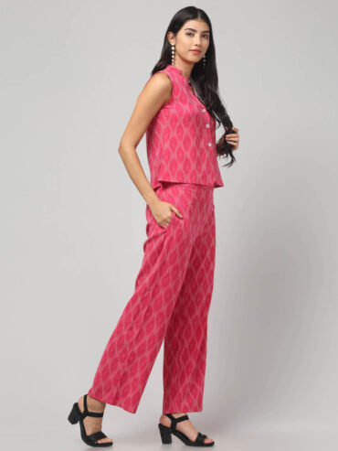 Indian model wearing candy floss pink ikat cotton co-ord set with sleeveless pochampally handloom top and pants