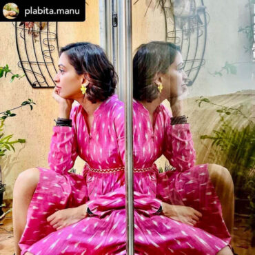 Pink Ikat handloom cotton fit and flare dress with pockets, full sleeves, collared neckline, tailored waist, sustainable women's wear by Abravi.