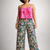 front view studio image of a pink handwoven Ikat Handloom Cotton crop top with white double Ikat pants on an Indian female model.