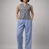 Handloom grey and white Ikat co-ord set with blue trousers on model