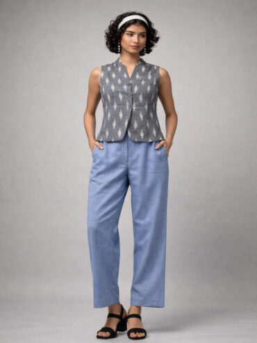 Handloom grey and white Ikat co-ord set with blue trousers on model